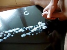 Cum on glass table