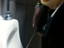 CAUGHT Big Dick Black Guy Pissing